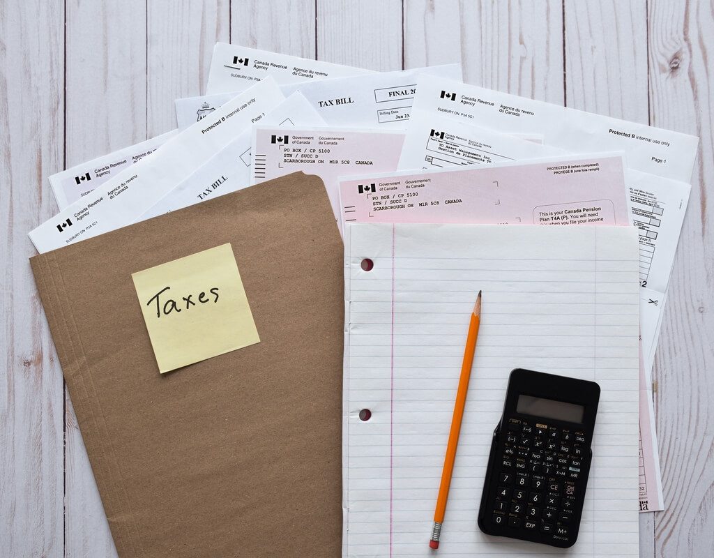 How to Prepare for Annual Tax Reporting file folder with paperwork to prepare yearly annua 2025 03 12 21 27 14 utc