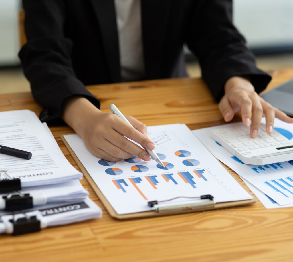 Cash Flow vs Profit: What Business Owner Should Know businesswoman working on document on business char 83bklp3 (1)
