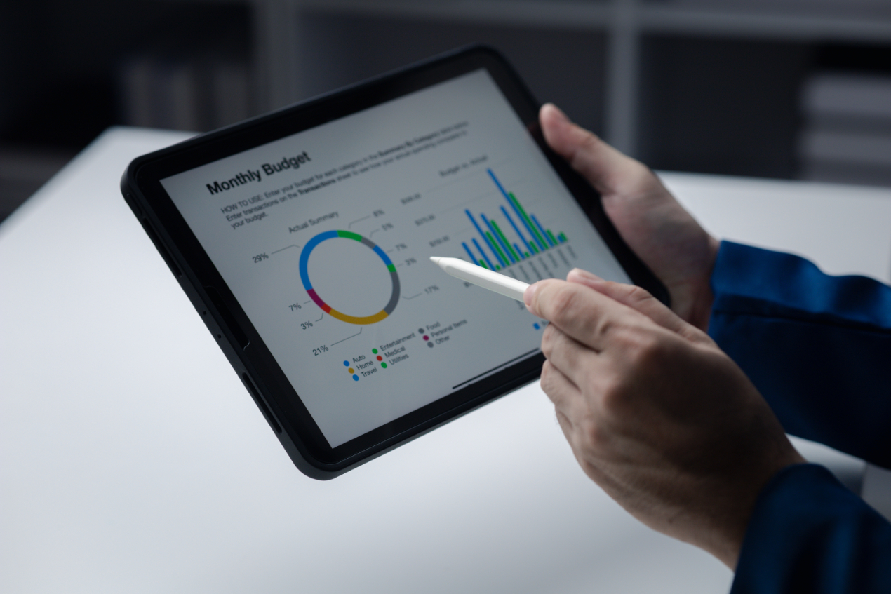 Budgeting Tips for First-Time Entrepreneurs person looking at data on tablet businessman owner cx6lmmd (1)