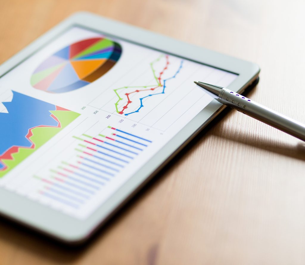 Choosing the Right Financial Tools for Your Business tablet computer and financial chart mth6ybc (1)